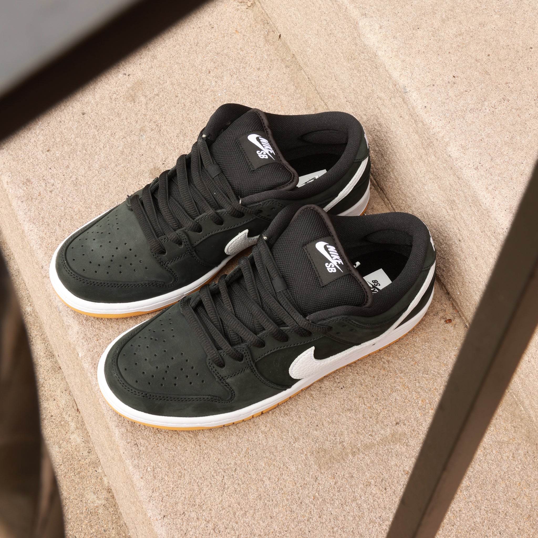 Nike SB Dunk Low Pro (Black/White-Gum) restocked in sizes 8-13