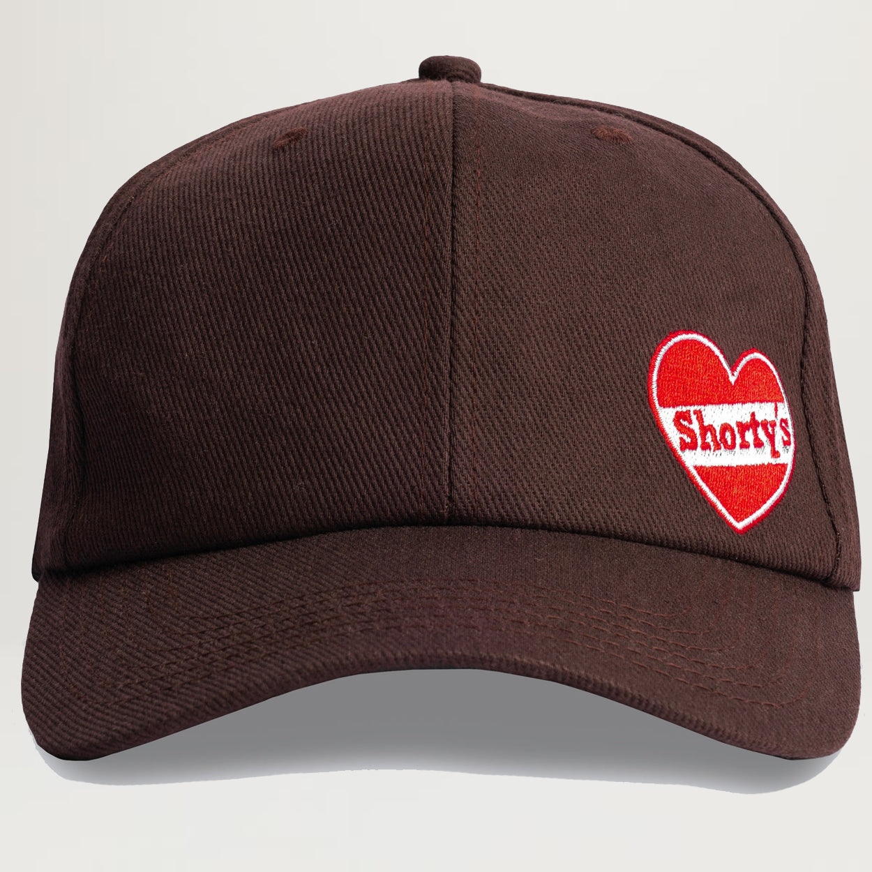 【PLEASURES】 HEART SNAPBACK Brown Pleasures Heart Snapback (Brown) - NewYakCity